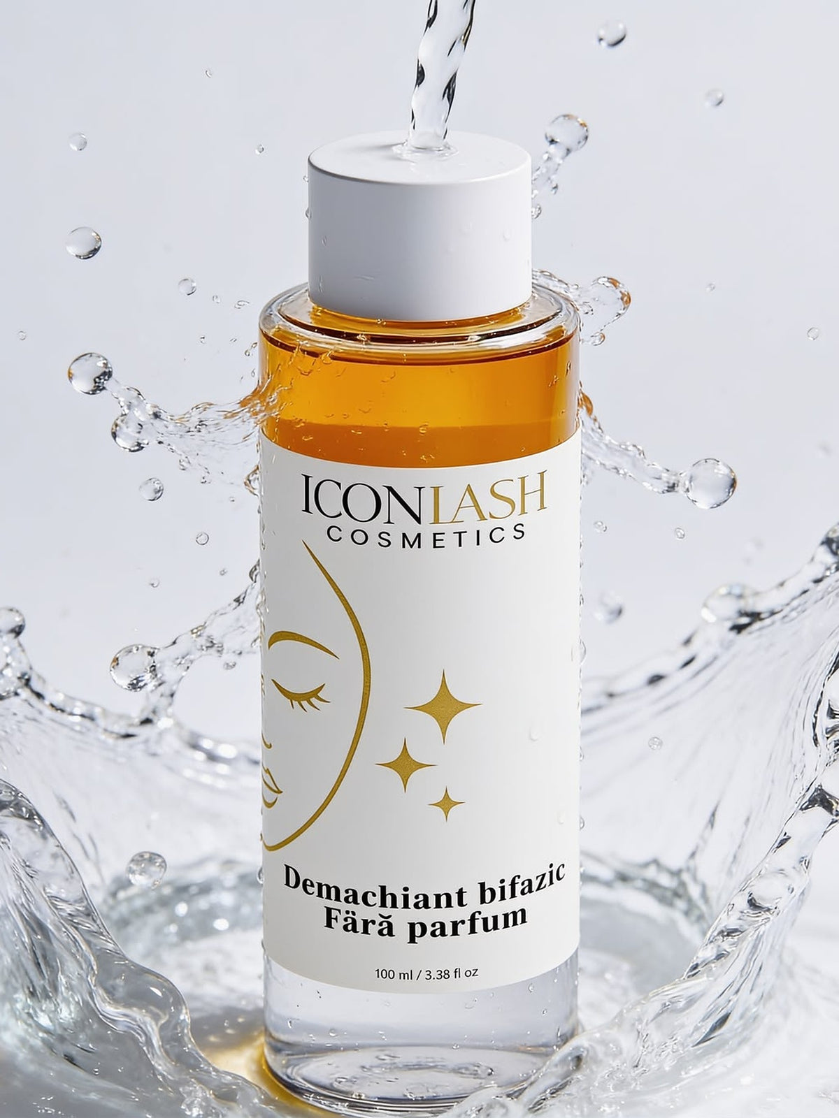 Flaconul de 100 ml al demachiantului bifazic IconLash fără parfum, în stropi de apă